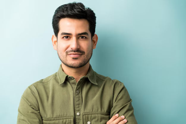 closeup-young-hispanic-man-casuals-studio_662251-600.avif